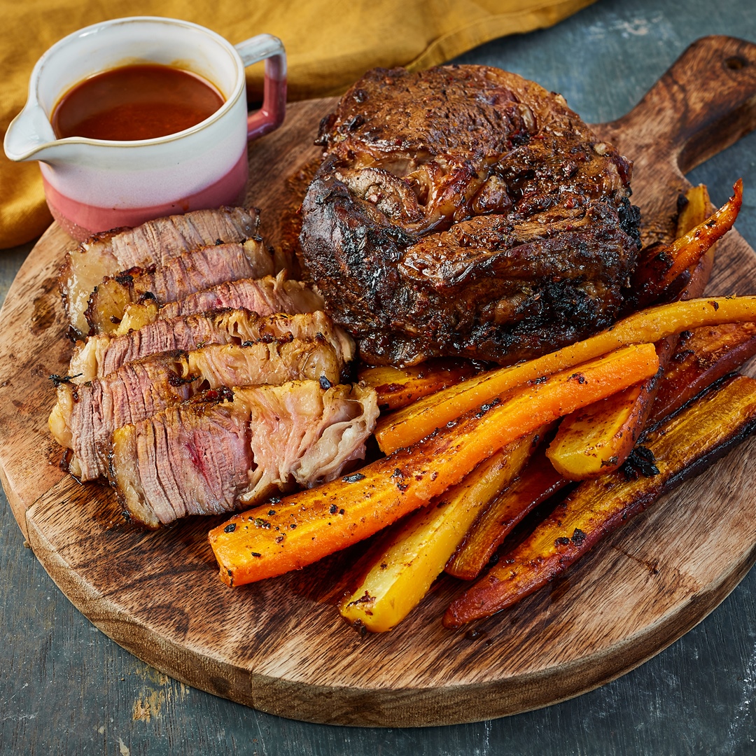 Black garlic and chipotle roast beef with beef dripping carrots
